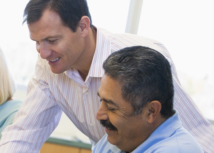 male peer support worker with male client