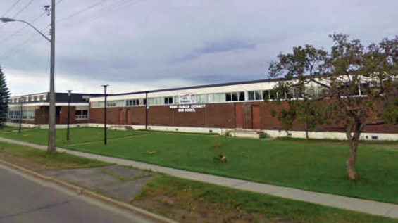 institutional building with a grass front yard